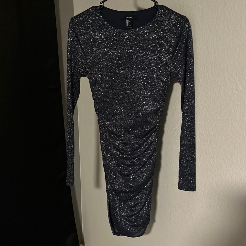 Sparkly, blue, long sleeve cocktail dress.